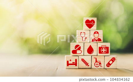 Lay out wooden blocks with icons of medical health. health insurance for your health concept. Healthcare medical business, medical technology equipment icon. 104834162