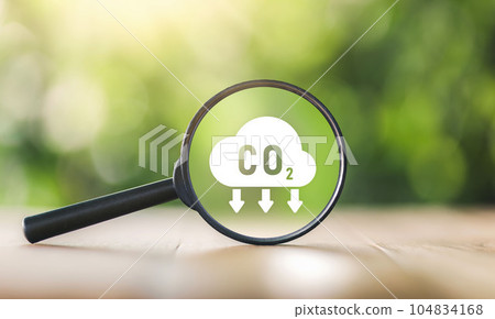 CO2 emission concept. Green industries business concept. Net zero emissions. Magnifying glass with Co2 symbol. Concepts Net Zero Emissions Goals A climate-neutral. CO2 emission concept. Green industries business concept. Net zero emissions. Magnifying glass with Co2 symbol. Concepts Net Zero Emissions Goals A climate-neutral. 104834168