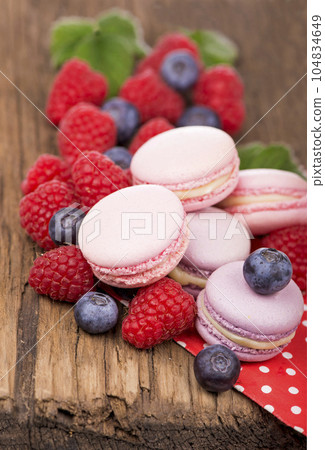 Macaroon on a wooden background 104834649