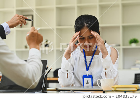 Frustrated intern receiving unfair reprimand rebuke, suffers from bad attitude at work. Emotional pressure and stress at work concept 104835179