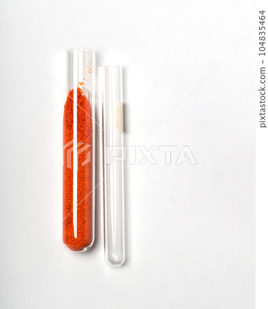 Closeup chemical ingredient on white laboratory table. Potassium Ferricyanide in test tube. 104835464