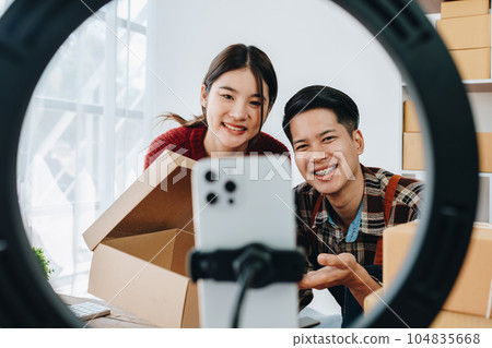 family business Asian people, vlogger, blog, presenting online products, live video, social media, record her, sell online via digital cameras. family business Asian people, vlogger, blog, presenting online products, live video, social media, record her, sell online via digital cameras. 104835668