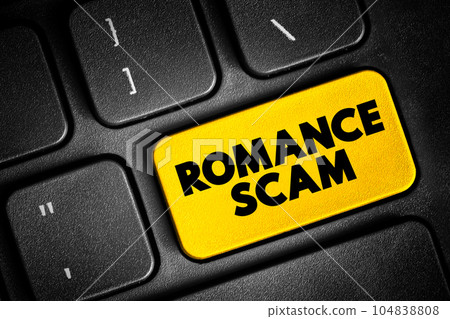 Romance scams - when a criminal adopts a fake online identity to gain a victim's affection and trust, text button on keyboard, concept background Romance scams - when a criminal adopts a fake online identity to gain a victim's affection and trust, text button on keyboard, concept background 104838808