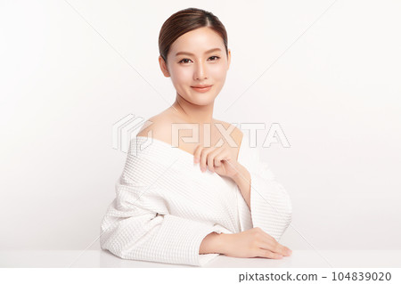 Beautiful young asian woman with clean fresh skin on white background, Face care, Facial treatment, Cosmetology, beauty and spa, Asian women portrait. Beautiful young asian woman with clean fresh skin on white background, Face care, Facial treatment, Cosmetology, beauty and spa, Asian women portrait. 104839020