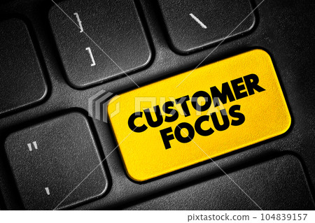 Customer Focus - strategy that puts customers at the center of business decision-making, text concept button on keyboard 104839157