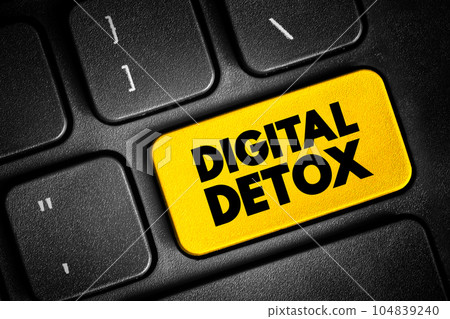 Digital Detox - period of time when a person voluntarily refrains from using digital devices, text concept button on keyboard 104839240