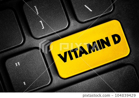 Vitamin D - group of fat-soluble secosteroids responsible for increasing intestinal absorption of calcium, magnesium, and phosphate, and many other biological effects, text button on keyboard Vitamin D - group of fat-soluble secosteroids responsible for increasing intestinal absorption of calcium, magnesium, and phosphate, and many other biological effects, text button on keyboard 104839429