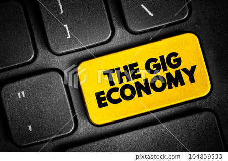The Gig Economy text button on keyboard, concept background The Gig Economy text button on keyboard, concept background 104839533