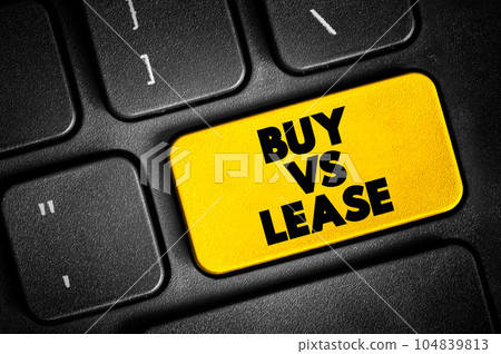 Buy Vs Lease text quote on keyboard, concept background Buy Vs Lease text quote on keyboard, concept background 104839813