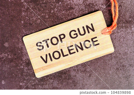 STOP GUN VIOLENCE text on the card STOP GUN VIOLENCE text on the card 104839898