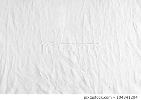 Wrinkled, crumpled white jersey fabric texture background 104841294