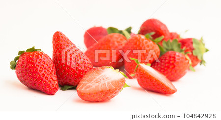 fresh appetizing strawberries on a white background fresh appetizing strawberries on a white background 104842928