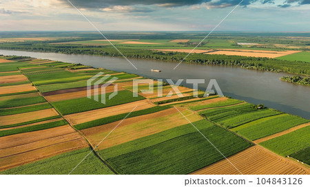 Aerial view of fields on bank of Danube Aerial view of fields on bank of Danube 104843126