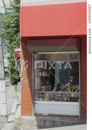 Tobacco shop and candy shop in downtown 104844067