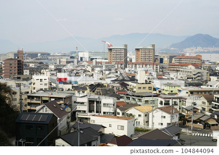 A city with a shipyard 104844094