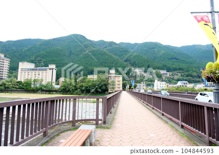 Gero City, Gifu Prefecture _ West facing scenery from Gero Bridge 2_2022 Gero City, Gifu Prefecture _ West facing scenery from Gero Bridge 2_2022 104844593