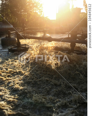 Machines are working hard to treat the wastewater from rubber scrap production to keep the environment clean 104845612