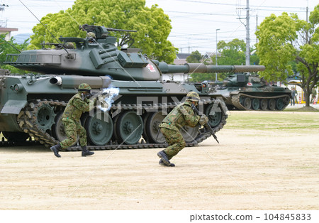 Ground Self-Defense Force personnel assaulting at a training exhibit Ground Self-Defense Force personnel assaulting at a training exhibit 104845833