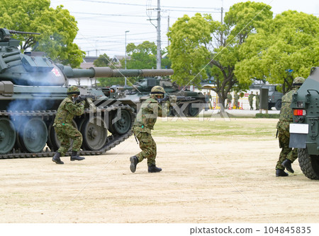 Ground Self-Defense Force personnel assaulting at a training exhibit 104845835