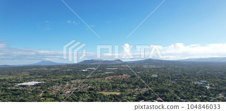 Panoramic view of green volcanic landscape Panoramic view of green volcanic landscape 104846033