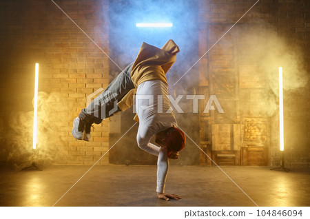 Male street artist b-boying performing breakdancing active training 104846094