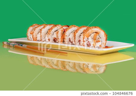 Sushi sets, rolls with caviar, shrimp, tuna and avocado and Philadelphia cheese, on a white plate. 104846676