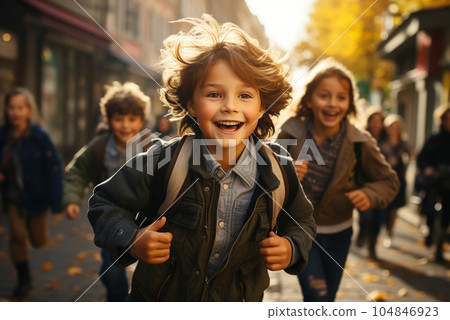 Schoolchildren have fun running after school. 104846923