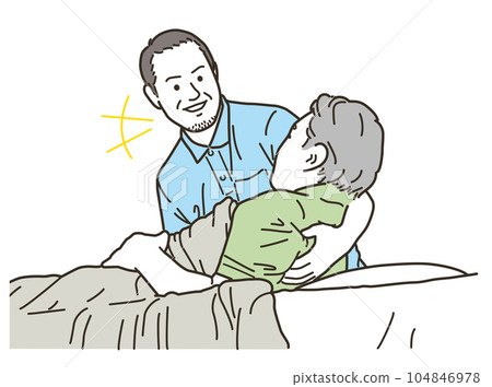 Male caregiver helping the elderly in bed 104846978