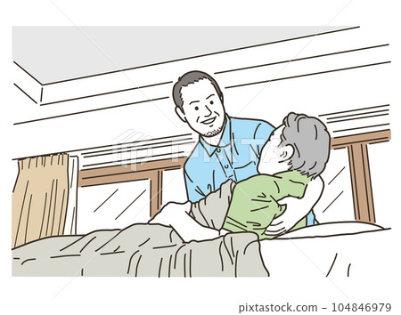 Male caregiver helping the elderly in bed 104846979