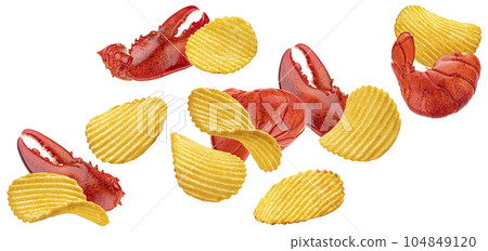 Falling ridged potato chips with lobster isolated on white background Falling ridged potato chips with lobster isolated on white background 104849120