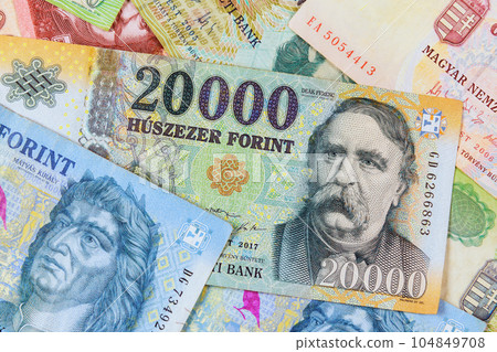 Close-up of HUF cash Hungarian forints, accepted legal tender in Hungary different sizes. Close-up of HUF cash Hungarian forints, accepted legal tender in Hungary different sizes. 104849708