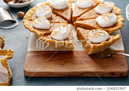 Sweet potato pie with marshmallow topping 104852997