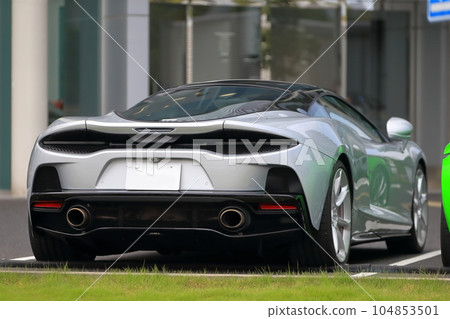Image of a sports car in a parking lot 104853501