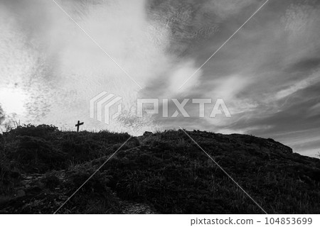 Clouds and hills 104853699