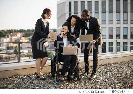 Professionals analyzing new project via modern technologies Professionals analyzing new project via modern technologies 104854764