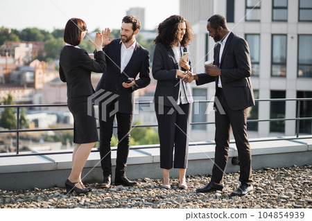 Diverse investors shaking hands and agreeing for partnership Diverse investors shaking hands and agreeing for partnership 104854939