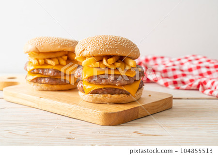 pork burger with cheese and french fries 104855513