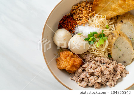 spicy egg noodles with fish balls and shrimp balls without soup 104855543