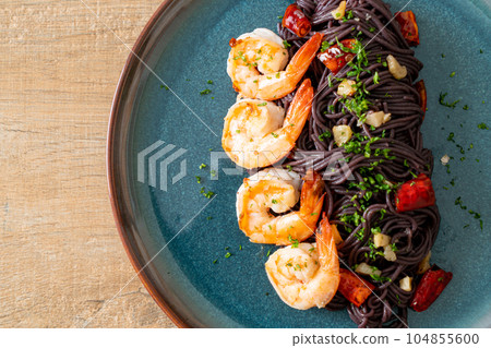 stir-fried black spaghetti with garlic and shrimps stir-fried black spaghetti with garlic and shrimps 104855600