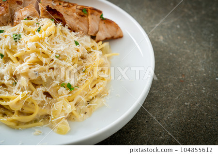 spaghetti white creamy sauce with grilled chicken spaghetti white creamy sauce with grilled chicken 104855612
