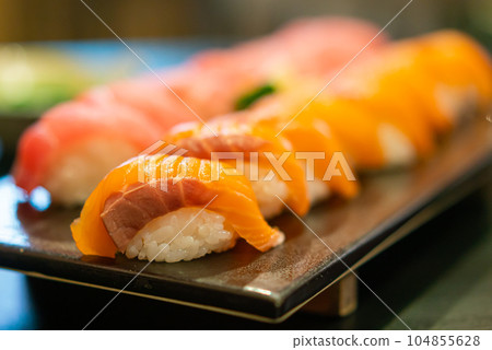 fresh salmon raw sushi on plate 104855628