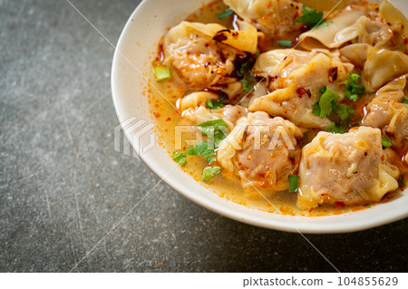 pork wonton soup or pork dumplings soup with roasted chili 104855629