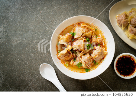 pork wonton soup or pork dumplings soup with roasted chili 104855630