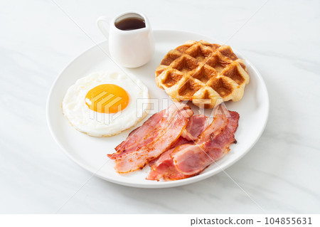 fried egg with bacon and waffle 104855631