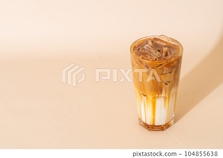 caramel macchiato coffee in glass caramel macchiato coffee in glass 104855638