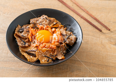 pork bulgogi rice bowl with kimchi and Korean pickled egg pork bulgogi rice bowl with kimchi and Korean pickled egg 104855785