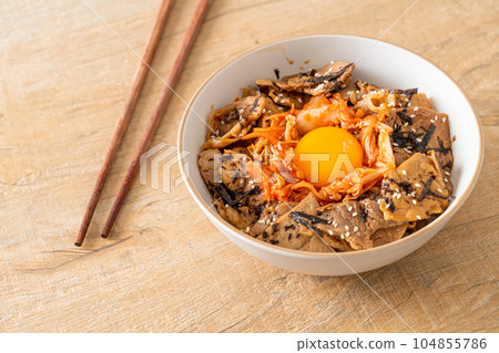 pork bulgogi rice bowl with kimchi and Korean pickled egg pork bulgogi rice bowl with kimchi and Korean pickled egg 104855786
