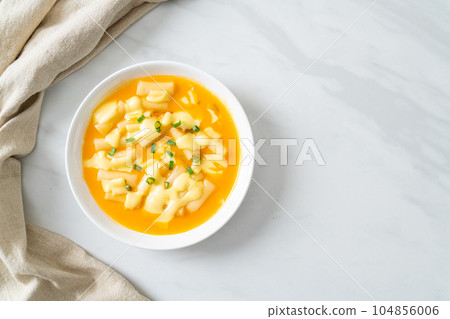 tteokbokki with cheese or Korean rice cake with cheese tteokbokki with cheese or Korean rice cake with cheese 104856006