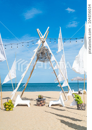 patio outdoor table and chair on beach with sea beach background 104856034