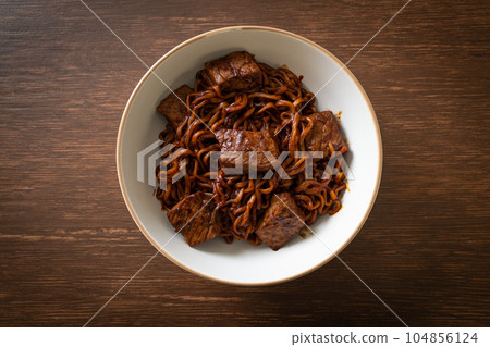 Jjapaguri or Chapaguri, Korean Black Beans Spicy Noodles with Beef Jjapaguri or Chapaguri, Korean Black Beans Spicy Noodles with Beef 104856124
